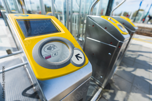 Photography Closeup shot of yellow ticket barrier in the Netherlands