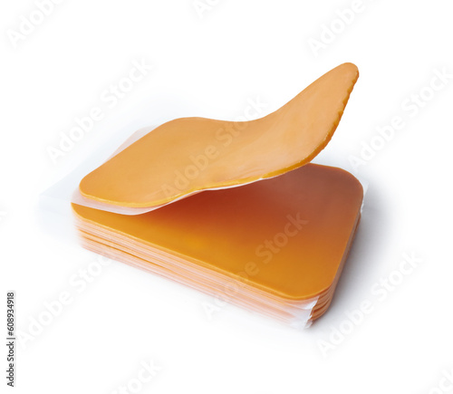 Slices of norwegian brunost traditional brown cheese close up photo