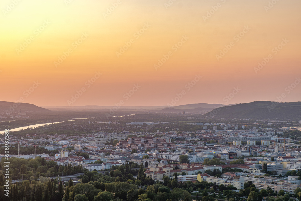 Vienna at sunset. The view over Vienna at dusk. View over Austrian city before evening. Before evening in  Vienna
