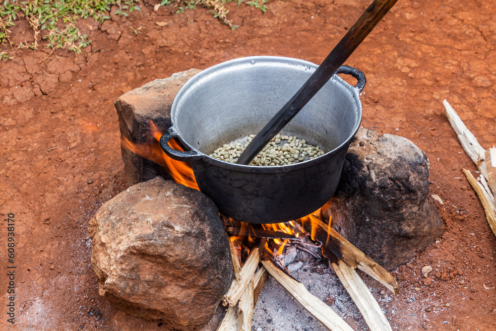 Coffee roasting at a farm in Sipi village, Uganda Coffee roasting at a farm in Sipi village, Uganda