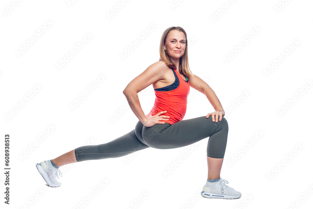 A woman in sportswear is doing exercises. Health, energy and a beautiful body. Isolated on white background.