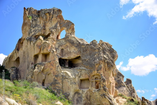 Turkiye, Goreme, positioned between the rock formations called fairy chimneys, between valleys and rock churches. Declared a UNESCO World Heritage Site