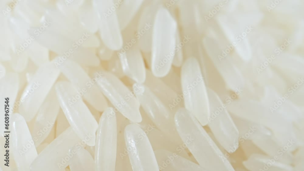 A closer look reveals the delicate aroma that wafts up from the rice. The scent is subtly sweet and floral, reminiscent of jasmine blossoms, from which the rice gets its name. Macro footage 4K
A closer look reveals the delicate aroma that wafts up from the rice. The scent is subtly sweet and floral, reminiscent of jasmine blossoms, from which the rice gets its name. Macro footage 4K