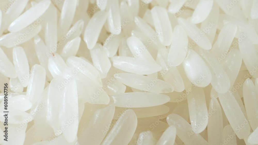 In macro video, the camera captures the ethereal elegance of jasmine rice on the floor. The grains seem to float above the surface, suspended in mid-air. The soft lighting accentuates their beauty
In macro video, the camera captures the ethereal elegance of jasmine rice on the floor. The grains seem to float above the surface, suspended in mid-air. The soft lighting accentuates their beauty