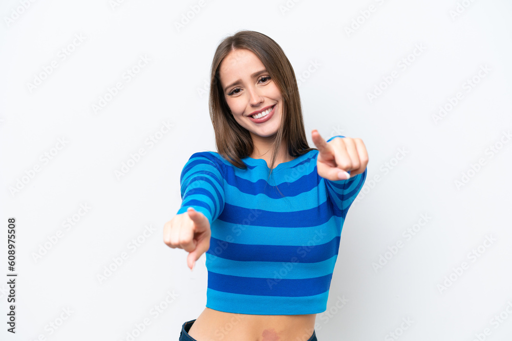 Young pretty caucasian woman isolated on white background pointing front with happy expression Young pretty caucasian woman isolated on white background pointing front with happy expression