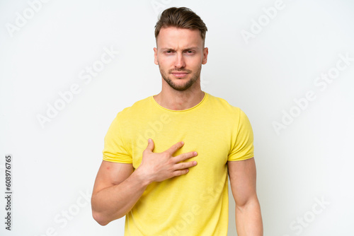 Young blonde caucasian man isolated on white background pointing to oneself