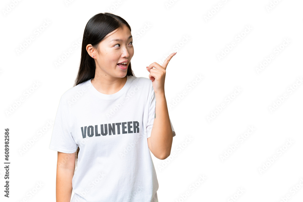 Young volunteer woman over isolated chroma key background intending to realizes the solution while lifting a finger up Young volunteer woman over isolated chroma key background intending to realizes the solution while lifting a finger up
