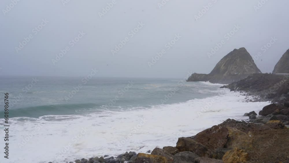 Waves crash on the shore off of Pacific Coast Highway in Southern California. Waves crash on the shore off of Pacific Coast Highway in Southern California.