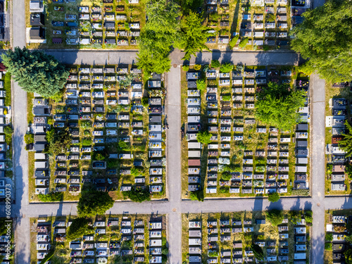 Obraz na płótnie Aerial view of the cemetery. Photo from a drone. Tombs, alleys, park. w salonie