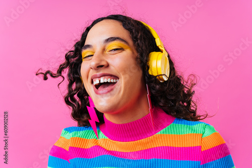 Creative studio portrait of beautiful hispanic woman with diastema photo