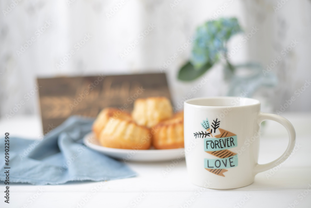 A cup of coffee and handmade muffins. Baking with sugar A cup of coffee and handmade muffins. Baking with sugar