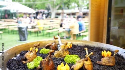 Delicious decorated street food on display on a big metal plate