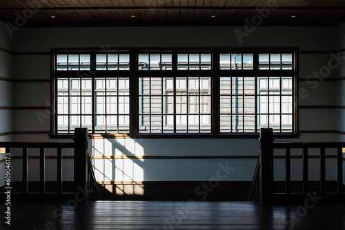 光が射す木造校舎の階段踊り場 photo