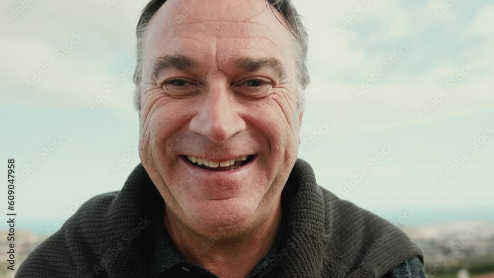 Happy Caucasian senior man having fun smiling on camera at house rooftop Happy Caucasian senior man having fun smiling on camera at house rooftop