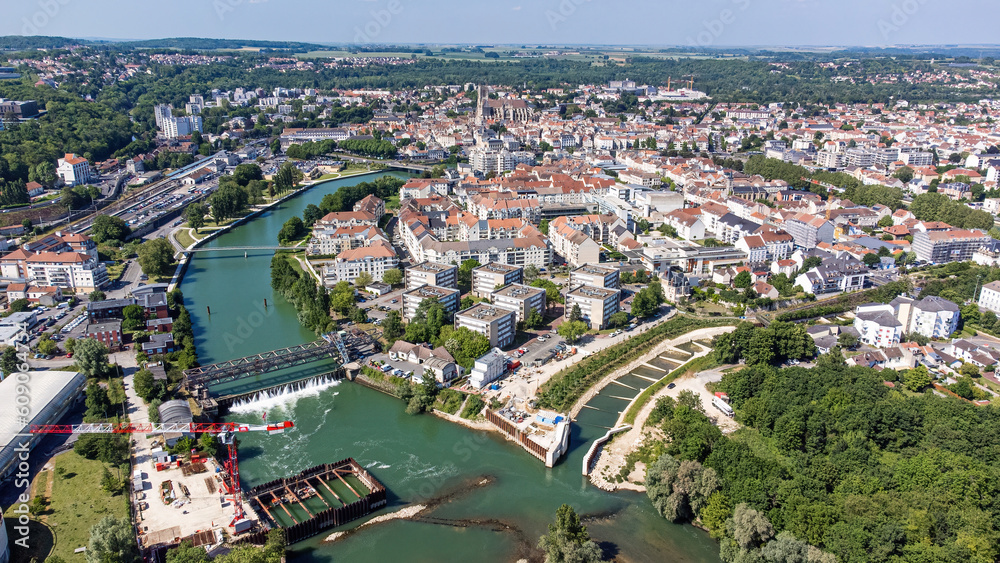 Fototapeta premium Aerial view of the construction of the new dam of Meaux in the Marne river along with a new fish pass built in the ancient Cornillon Canal in the French department of Seine et Marne near Paris, France