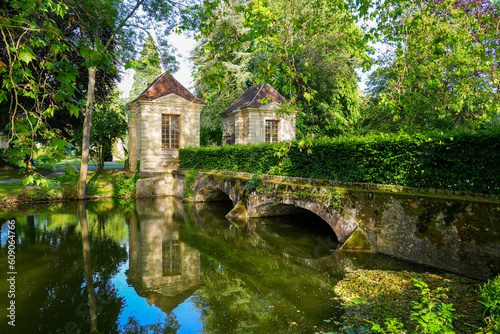Ancient bridge spanning the Grand Morin river in the Parc des Capucins ("Capuchin Park"), a public garden of the city of Coulommiers in the Brie region of the department of Seine et Marne in France