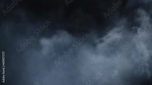 Immersive mesmerising spooky Halloween smoke cloud VFX insert element in 4k slow-motion. A captivating, ethereal swirling, mysterious atmosphere, cloudy mist fog. 