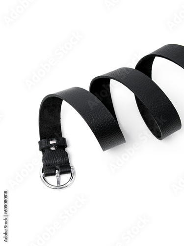 Women's black leather belt on white background. Twisted belt