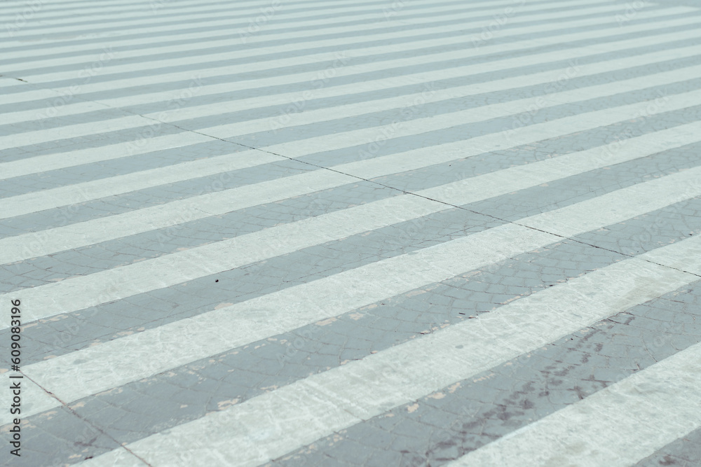 Fototapeta premium Rhythm or patterns generated by a zebra pedestrian crossing.