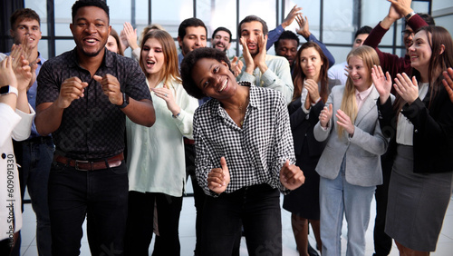 Business people clapping their hands after a seminar