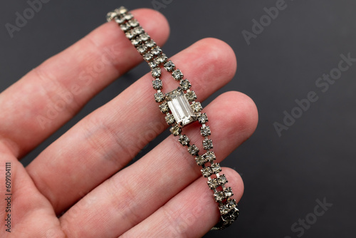 Dainty clear crystal bracelet, unique vintage jewelry background, rhinestone jewelry concept, promotional photo for an online jewellery store