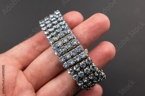 Chunky blue crystal bracelet, unique vintage jewelry background, rhinestone jewelry concept, promotional photo for an online jewellery store