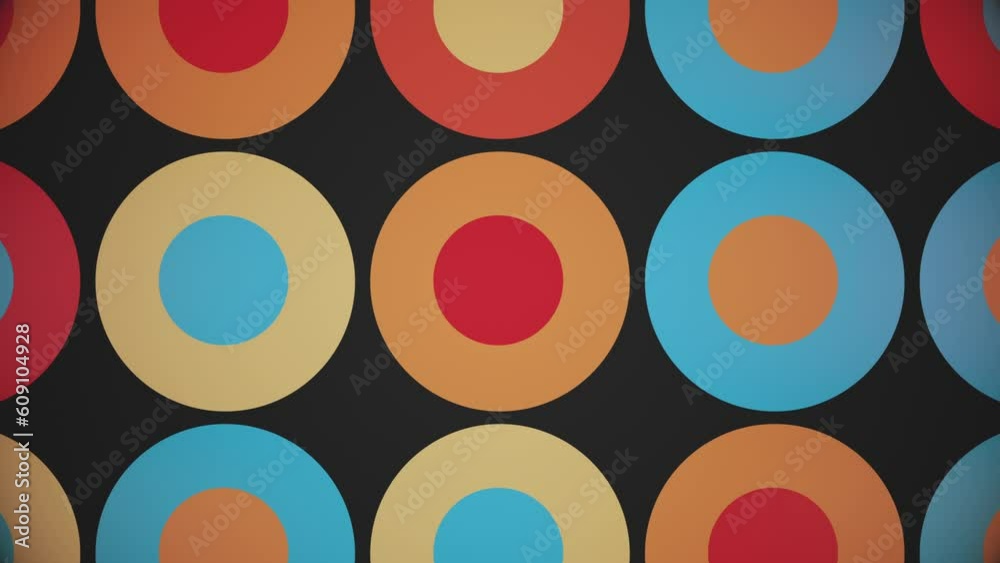 Trendy retro 1970s geometric background with colorful blinking circles in warm color tones - beige, orange, red and blue. This stylish vintage motion background animation is 4K and a seamless loop.
