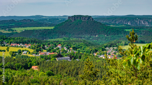 Magical enchanted fairytale forest, sandstone rock Lilienstein viewed from Kleinhennersdorfer Stein and top bird view at the hiking trail in the national park Saxon Switzerland, Bad Schandau, Germany.