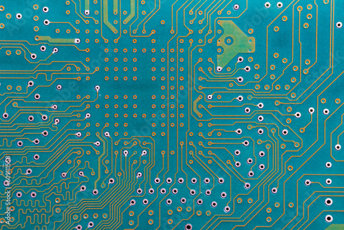 Motherboard, electronic circuit texture background. Hard disk macro photo