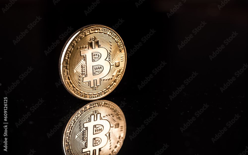 Bitcoin. Crypto currency Gold Bitcoin, BTC, Bit Coin. Macro shot of Bitcoin coins isolated on black background. Bitcoin. Crypto currency Gold Bitcoin, BTC, Bit Coin. Macro shot of Bitcoin coins isolated on black background.