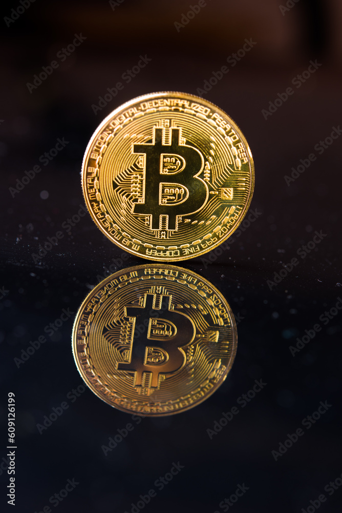 Bitcoin. Crypto currency Gold Bitcoin, BTC, Bit Coin. Macro shot of Bitcoin coins isolated on black background. Bitcoin. Crypto currency Gold Bitcoin, BTC, Bit Coin. Macro shot of Bitcoin coins isolated on black background.