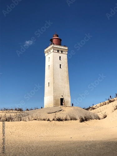 lighthouse on the beach © Mentall Wellness
