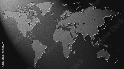 world map incised into black marble or granite, lit by spotlight from top left