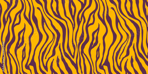 Tiger yellow brown seamless pattern. Vector animal skin print. Fashion organic texture.
