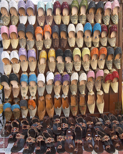 Shoes and sandals for sale at a market at Dubai Creek, Dubai UAE.