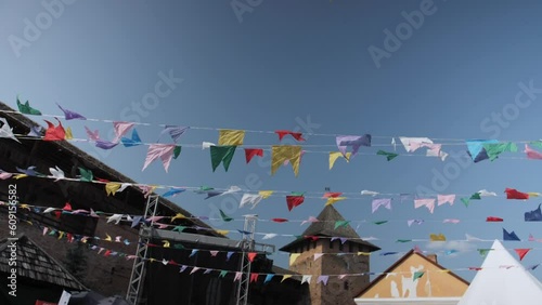 Garlands of colored flags at the festival photo