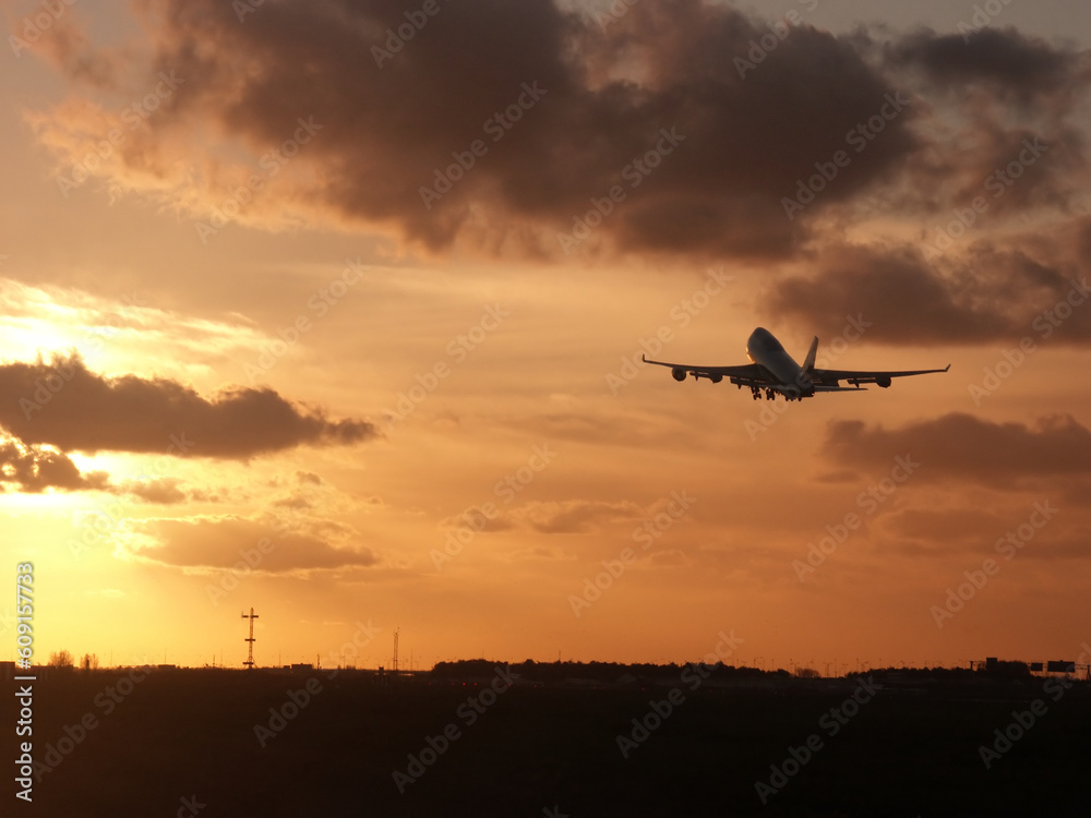 Cloudy Sunrise take-off for a tropical destination. Cloudy Sunrise take-off for a tropical destination.