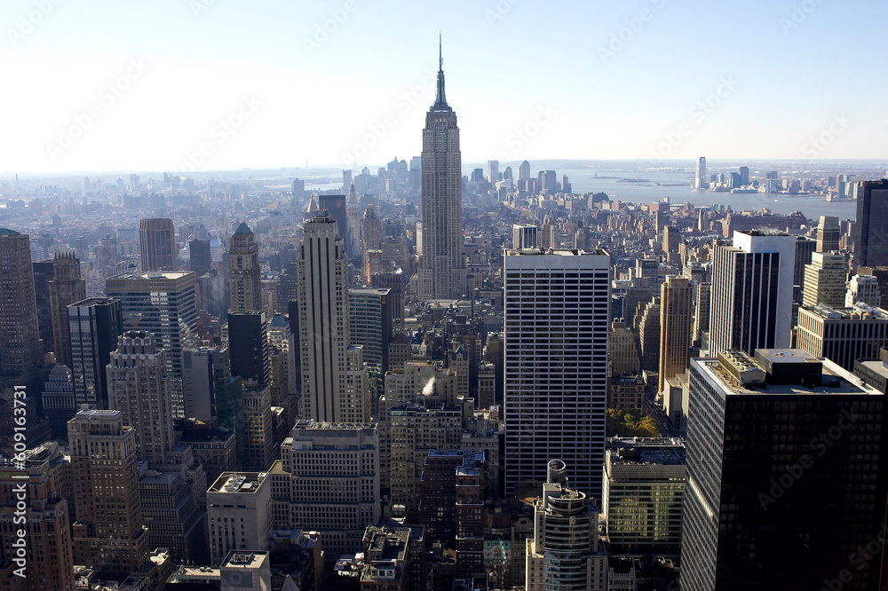 View of empire state building and downtown manhattan from the roof of the rockefeller building, new york, america, usa