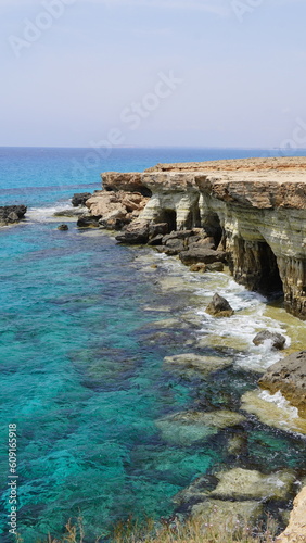 Sea caves cape greco Cyprus blue lagune water sea travel views photo