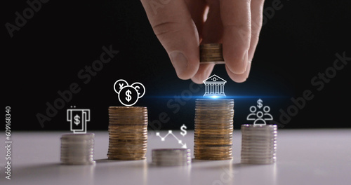 Businessman saving money concept. Hand holding coinsBusiness finance and investment concept, Capital gain world money economic growth. coin stack financial graph chart, market report on cash currency 