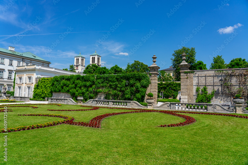 Beautiful Mirabell palace in Salzburg Austria with rose garden and statues