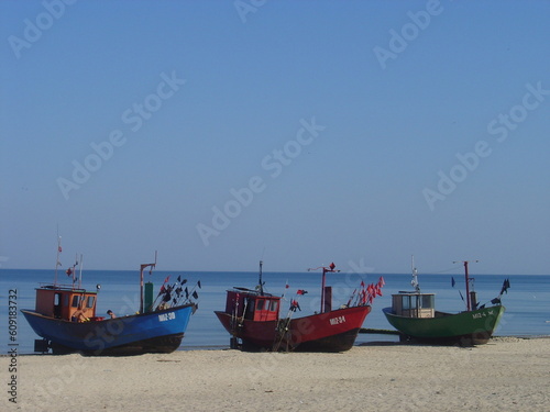 Three boats on the beach