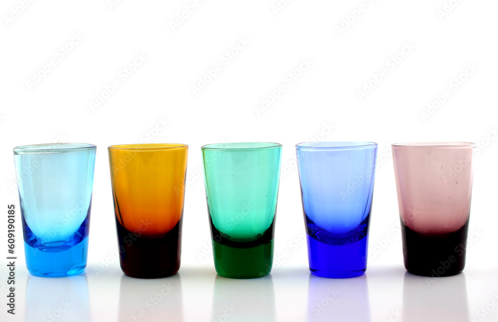 Close up of brightly colored drinking glasses Close up of brightly colored drinking glasses