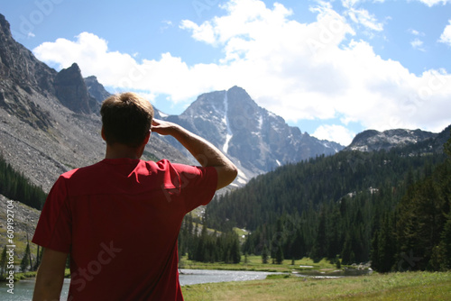 Day hiker catching a glimpse of Whitetail Peak, Montana.