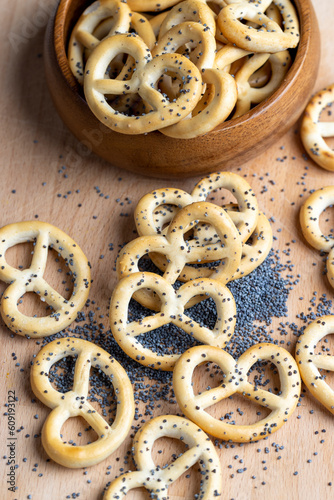 wheat hard bagels with poppy seeds on the table photo