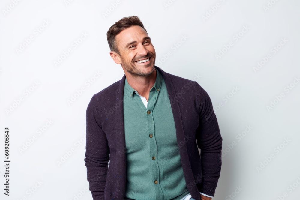 Portrait of a handsome man smiling and looking away isolated on a white background Portrait of a handsome man smiling and looking away isolated on a white background