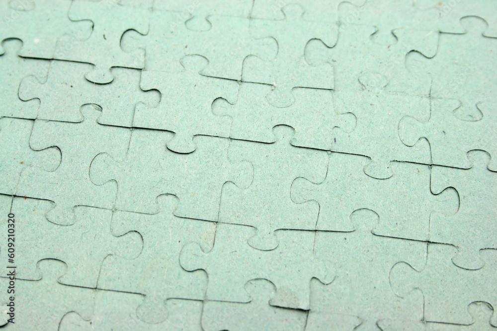 Close up of a Jigsaw all pieces in puzzle Close up of a Jigsaw all pieces in puzzle