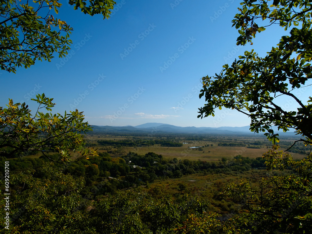 autumn countryside panorama with blue sky