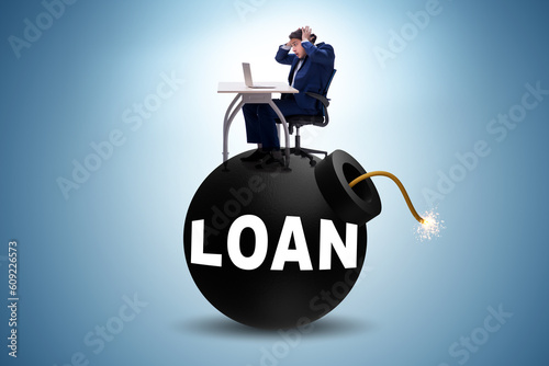 Debt and loan concept with exploding bomb