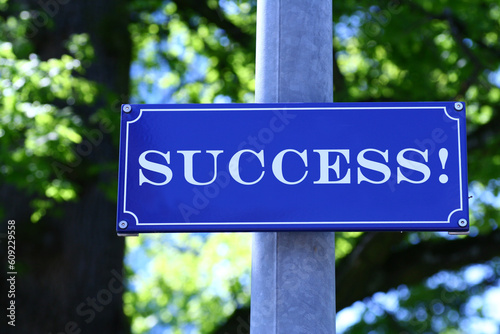 Street sign which says "Success"